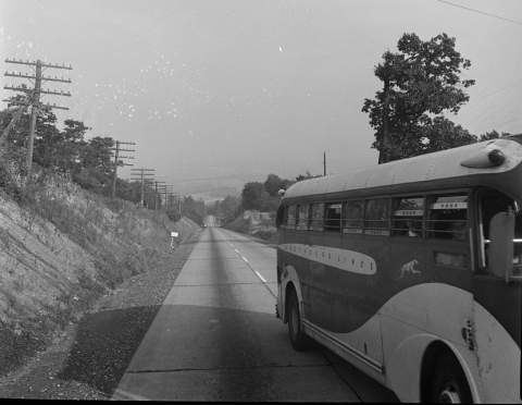 A bus travels on the highway